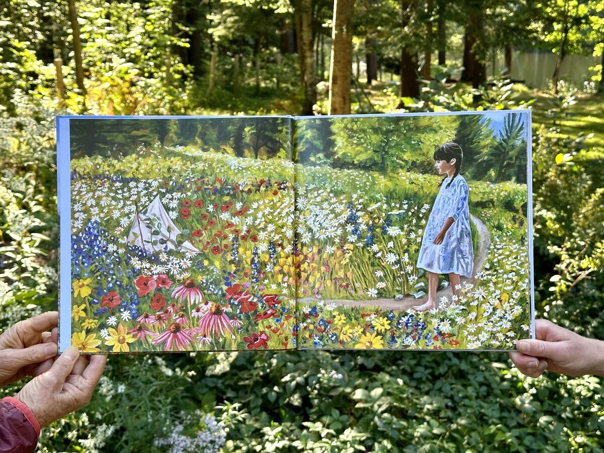 A spread from The Girl and the Boat: woods and wildflowers
