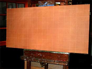 The canvas ruled into a grid for transferring the sketch